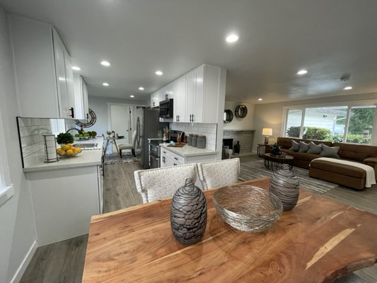 KITCHEN REMODEL - This remodel was done on an old kitchen that was in bad shape. We gutted it and put in new cabinets and appliances to match the overall tone of the house and even added in a custom backsplash to give it some character. The owner absolutely loves cooking there now! KITCHEN REMODEL - This remodel was done on an old kitchen that was in bad shape. We gutted it and put in new cabinets and appliances to match the overall tone of the house and even added in a custom backsplash to give it some character. The owner absolutely loves cooking there now!