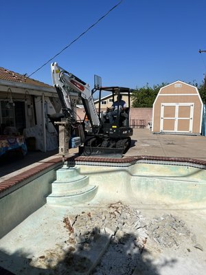 Hacienda Heights Pool Demo 2023 - This pool demolition took 7 days to complete. The owner went with the option to remove the entire pool shell. This option allows for structures to be built over the pool such as a guest house. This is a great option to increase the value of a property and also generate additional revenue by building an additional dwelling unit that can be rented out. Call or text for a free estimate 714-386-8859 Hacienda Heights Pool Demo 2023 - This pool demolition took 7 days to complete. The owner went with the option to remove the entire pool shell. This option allows for structures to be built over the pool such as a guest house. This is a great option to increase the value of a property and also generate additional revenue by building an additional dwelling unit that can be rented out. Call or text for a free estimate 714-386-8859