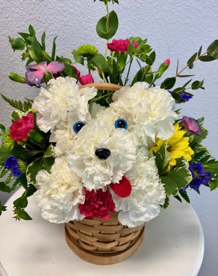 New Arrangements now available. - Our new and improved Birthday Pup is now available to order for that special someone. Stop by or visit our website to order.