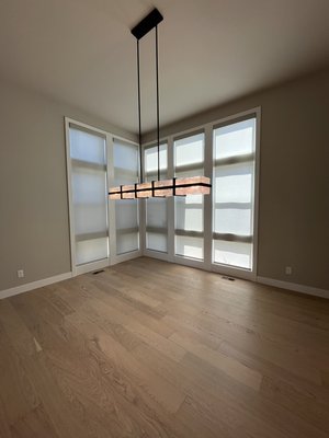 Parker Custom Home - We were able to complete this project for the homeowners before they moved in to the home. They wanted sleek and modern shades on the main level so we decided on roller shades. In the basement, they wanted temperature control hence the cellular shades. And in the master bathroom we wanted to match that wall and we did so perfectly!