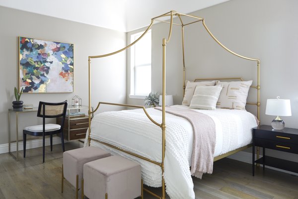 Classy Teenage Bedroom - For this classy elegant teenage bedroom the color theme was gold, black and pink. This unique color palette was fun to create – gold was the eminent color with black and pink accents that added the perfect classic touch to this interior design space.

The beautiful color gold was brought in through the canopy bed frame, glass top work desk, wall mirror and handles of the bedside tables. Black elements were brought out through the desk chair, bedside tables, planters and decor. Hints of pink were used as an accent to compliment the neutral wall color through blush pink ottomans, floral decor, and bed throws. This added a touch of softness in the interior of this room.

Our client loved to draw, so an abstract painting was added above her work desk for inspiration, which beautifully tied the interior design for whole room together.

Services:
Bedroom Interior Design
Color Consultation
Residential Interior Design
Full Service Interior Design