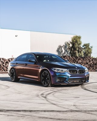 BMW M5 in Avery Rushing Riptide - This BMW M5 was wrapped in a stunning color shifting Avery Rushing Riptide. Depending on which way you look at it, this wrap shifts colors from Blue to Purple and a multitude of other colors as well! BMW M5 in Avery Rushing Riptide - This BMW M5 was wrapped in a stunning color shifting Avery Rushing Riptide. Depending on which way you look at it, this wrap shifts colors from Blue to Purple and a multitude of other colors as well!