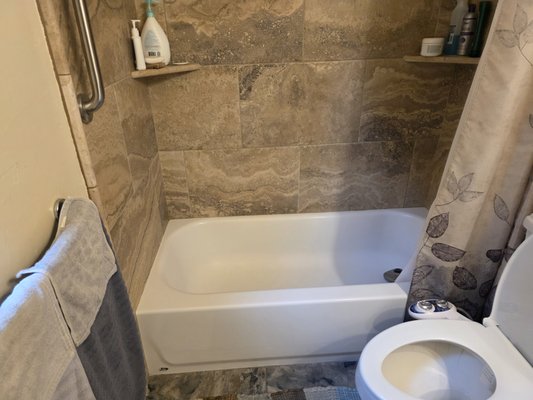 Walk-in shower renovation - We took this tub out, extended the walk in shower, repainted the vanity, centered the toilet and it installed shower glass sliding door. Walk-in shower renovation - We took this tub out, extended the walk in shower, repainted the vanity, centered the toilet and it installed shower glass sliding door.