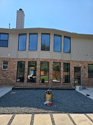 Window Replacement - We replaced all the windows in the house with new and sleek black frames.