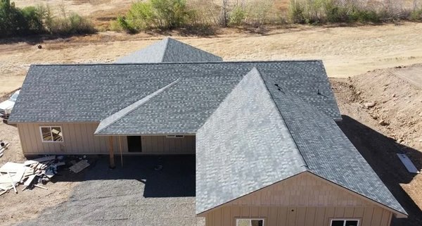 New Roof Project on New Construction in Yakima WA - We adhere to meticulous procedures, designed by industry-leading manufacturers, to guarantee optimal roof installation. As a family business, every task is treated as if it were our own. We consistently uphold our commitment to doubling down on honesty, quality, and respect. To reinforce this pledge, we offer a 5-year warranty and employ the latest IKO Roofing technology, ensuring top-quality service from the beginning to the end. New Roof Project on New Construction in Yakima WA - We adhere to meticulous procedures, designed by industry-leading manufacturers, to guarantee optimal roof installation. As a family business, every task is treated as if it were our own. We consistently uphold our commitment to doubling down on honesty, quality, and respect. To reinforce this pledge, we offer a 5-year warranty and employ the latest IKO Roofing technology, ensuring top-quality service from the beginning to the end.