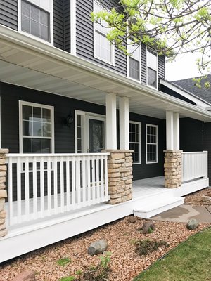 Exterior Front Porch Paint Project - This was a beautifully finished porch painting project. This was one of our many projects at this property. This project consisted of pressure washing, sanding and primer application.