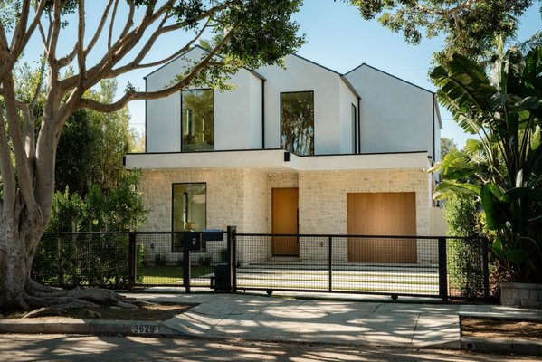New Construction in Mar Vista - Experience luxury and modern living in this newly built, custom-designed home on a beautiful tree-lined street. This one-of-a-kind residence blends contemporary style with timeless elegance and features a 4 bed / 4.5 bath main house plus a 1 bed / 1 bath attached ADU - perfect for guests or a flex space. The open-concept layout boasts high ceilings, abundant natural light, and a spacious living area with a cozy fireplace. The chef's kitchen is equipped with premium Thermador appliances, Taj Mahal quartzite counters, designer lighting, custom cabinetry, and a walk-in pantry. Enjoy two dining areas that open to the outdoors-ideal for entertaining. The first floor includes a guest suite, powder room, and a 1-car garage with mini-split HVAC-perfect for a gym or office. Upstairs offers three en-suite bedrooms and a laundry room. The luxurious primary suite features vaulted ceilings, custom Roman clay plaster walls, private balcony, walk-in closet, and spa-like bath. The private backyard includes a lush patio area surrounded by greenery and privacy hedges. Smart home features include Control4 automation, built-in speakers, security system with cameras, integrated lighting, and a paid-off solar system. Located in a desirable neighborhood close to upscale shopping, dining, and top-rated schools-this home offers luxury, function, and convenience. New Construction in Mar Vista - Experience luxury and modern living in this newly built, custom-designed home on a beautiful tree-lined street. This one-of-a-kind residence blends contemporary style with timeless elegance and features a 4 bed / 4.5 bath main house plus a 1 bed / 1 bath attached ADU - perfect for guests or a flex space. The open-concept layout boasts high ceilings, abundant natural light, and a spacious living area with a cozy fireplace. The chef's kitchen is equipped with premium Thermador appliances, Taj Mahal quartzite counters, designer lighting, custom cabinetry, and a walk-in pantry. Enjoy two dining areas that open to the outdoors-ideal for entertaining. The first floor includes a guest suite, powder room, and a 1-car garage with mini-split HVAC-perfect for a gym or office. Upstairs offers three en-suite bedrooms and a laundry room. The luxurious primary suite features vaulted ceilings, custom Roman clay plaster walls, private balcony, walk-in closet, and spa-like bath. The private backyard includes a lush patio area surrounded by greenery and privacy hedges. Smart home features include Control4 automation, built-in speakers, security system with cameras, integrated lighting, and a paid-off solar system. Located in a desirable neighborhood close to upscale shopping, dining, and top-rated schools-this home offers luxury, function, and convenience.