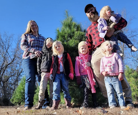 Meet The Cochrans! - We are a family of seven: Michael, Sarah, Nathanael, Abigail, Noelle, Annie, and Faith. We live on a 40 acre farm with cows, goats, chickens, peacocks, guinea, and of course our beloved English Cream Golden Retrievers. We enjoy our family time. Michael gets to work from home and Sarah homeschools our children. We get to spend most of our time together. We tackle most of our farm chores as a team along with cooking meals and exploring new things. When we aren't on the farm, you might find us spending time with our local church family or exploring the aquarium.
Our entire family raises our puppies; however, Sarah is the main person in charge of the daily interactions with all of our past and future SDG Family. If you call, email, text, etc., she is who you will most likely be chatting with. She has a passion and love for dogs and people. It is her joy to find perfect homes for each of our puppies. She also loves to stay in touch with our families to watch our puppies grow and make sure they have all the support they need.
Sarah began breeding Golden Retrievers as a little girl in Raytown, Missouri with her mother and brother, and she has been a professional dog groomer for 25 years. She has a Bachelor's of Animal Science from the University of Missouri and a Masters in Reproductive Physiology from South Dakota State University. She also is a literature review away from a PhD in Animal Molecular and Cellular Biology. She completed her courses, and all of her research is published and being used in the field. However, she chose to be with her family, and the time commitment for finishing her PhD while she had a baby was just not feasible. She made the tough yet rewarding decision to be a full-time, stay-at-home mom. Thankfully, she is able to put her education to good use in our breeding program with how we raise our dogs and puppies.
We look forward to meeting you and learning more about your family as well. Feel free to call or email us any time! Meet The Cochrans! - We are a family of seven: Michael, Sarah, Nathanael, Abigail, Noelle, Annie, and Faith. We live on a 40 acre farm with cows, goats, chickens, peacocks, guinea, and of course our beloved English Cream Golden Retrievers. We enjoy our family time. Michael gets to work from home and Sarah homeschools our children. We get to spend most of our time together. We tackle most of our farm chores as a team along with cooking meals and exploring new things. When we aren't on the farm, you might find us spending time with our local church family or exploring the aquarium.
Our entire family raises our puppies; however, Sarah is the main person in charge of the daily interactions with all of our past and future SDG Family. If you call, email, text, etc., she is who you will most likely be chatting with. She has a passion and love for dogs and people. It is her joy to find perfect homes for each of our puppies. She also loves to stay in touch with our families to watch our puppies grow and make sure they have all the support they need.
Sarah began breeding Golden Retrievers as a little girl in Raytown, Missouri with her mother and brother, and she has been a professional dog groomer for 25 years. She has a Bachelor's of Animal Science from the University of Missouri and a Masters in Reproductive Physiology from South Dakota State University. She also is a literature review away from a PhD in Animal Molecular and Cellular Biology. She completed her courses, and all of her research is published and being used in the field. However, she chose to be with her family, and the time commitment for finishing her PhD while she had a baby was just not feasible. She made the tough yet rewarding decision to be a full-time, stay-at-home mom. Thankfully, she is able to put her education to good use in our breeding program with how we raise our dogs and puppies.
We look forward to meeting you and learning more about your family as well. Feel free to call or email us any time!