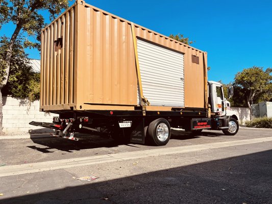 Relocation and engineering of placement of containers - Carefully loading minimal damage to any surfaces , relocation strap down and delivery of storage containers , carefully maneuvered and placement of precise position of containers . Using metric and geometry to maneuver, facilitate and place container and positions determined by customers .
