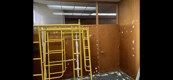 Office space renovation!!! - This single office was 50 years out of date. There was water and nicotine damage in the ceiling, on the walls and in the carpet. Rather than replace the walls, we used a special Primer to seal out the water damage and the nicotine. We used a skim coat to even out the walls where the panels met sanded then primed it with drywall primer, then painted all of the surfaces in the space. The flooring and the color were carefully chosen by our interior decorator to help minimize the bright lighting in the space without having to spend a fortune on new lighting. We updated the space using what was already there and adding new flooring and trim. This was a highly cost effective solution to the customer considering the alternatives of completely gutting the space or not renting it out at all. Office space renovation!!! - This single office was 50 years out of date. There was water and nicotine damage in the ceiling, on the walls and in the carpet. Rather than replace the walls, we used a special Primer to seal out the water damage and the nicotine. We used a skim coat to even out the walls where the panels met sanded then primed it with drywall primer, then painted all of the surfaces in the space. The flooring and the color were carefully chosen by our interior decorator to help minimize the bright lighting in the space without having to spend a fortune on new lighting. We updated the space using what was already there and adding new flooring and trim. This was a highly cost effective solution to the customer considering the alternatives of completely gutting the space or not renting it out at all.