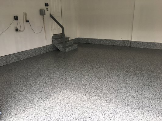 Garage Floors Transformation! - This project involved transforming a dull concrete garage floor with a beautiful and durable epoxy coating. The epoxy floor provides a much easier to clean surface that will resist scratches, stains, and chemicals, perfect for a high-traffic area like a garage. We used a light gray epoxy with flecks of black to create a modern and stylish look. The client is now happy to have a garage floor that looks great and is easy to maintain. Garage Floors Transformation! - This project involved transforming a dull concrete garage floor with a beautiful and durable epoxy coating. The epoxy floor provides a much easier to clean surface that will resist scratches, stains, and chemicals, perfect for a high-traffic area like a garage. We used a light gray epoxy with flecks of black to create a modern and stylish look. The client is now happy to have a garage floor that looks great and is easy to maintain.