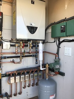 Boiler Replacment - The customer had bought a house where the boiler and controls had been stolen, we were able to reconnect system with a high efficiency tankless heater and new controls.