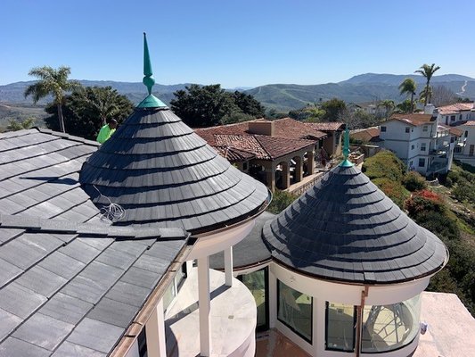 Concrete Tile Roof - 7,500 square foot custom concrete flat tile by Eagle Tile. Custom round turrets, metals and decking. Concrete Tile Roof - 7,500 square foot custom concrete flat tile by Eagle Tile. Custom round turrets, metals and decking.