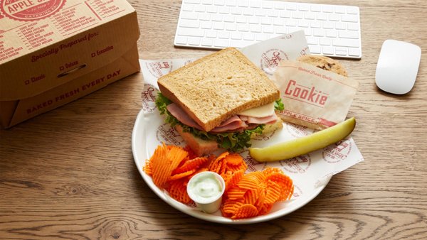 Box Lunch Catering - TRUST THE BOX LUNCH
Catering Experts
When you’re asked to order lunch for a few people or everyone at a big meeting, you want a fast, easy solution. At Apple Spice Catering, we offer delicious box lunches brimming with everyone’s favorite foods.
For more than 30 years, we’ve specialized in individual lunch box catering for companies like yours. Let us take one of your most important responsibilities off your plate — all the while plating up unparalleled goodness for your teammates, clients, and guests.
Order box lunch catering and delivery now. You can schedule a delivery for a future date or a meal in a few hours. We’re flexible, allowing you to get the healthy choices you deserve without compromise or fuss.
WHAT'S INSIDE THE BEST BUSINESS BOX LUNCH
Our box lunches are the ideal way to fuel up everyone on your corporate lunch catering list. Each meal contains homemade items including sandwiches, soups, and salads. At Apple Spice Catering, we insist on using premium ingredients. From our deli meats and cheeses to our famous fresh-baked bread and cookies, we never skimp on quality. We ensure your dining enjoyment from the first bite to the last morsel.
Want another reason to appreciate an all-in-one boxed lunch that contains everything in one package? It's a safe way to get food from our kitchen to your business. Never worry about having to handle other people's lunches or opening boxes to figure out what's inside. Every catered box lunch is labeled with the recipient's name for maximum peace of mind and convenience.
Whether you have a seriously large crew to feed or just a few folks in need of a noontime meal, trust us for box lunch delivery on time, every time.
BOXED LUNCH DELIVERY
Leaving the office to pick up dozens of individual boxed lunches can eat up your productivity and put a dent in your workflow. When you need catered lunches, count on Apple Spice to deliver them right to your business.
Boxed up efficiently with delicious food, our lunch boxes are created to your specifications and coordinated to your schedule. We're known for being prompt and pleasant. Every interaction you have with our team members will show you why we've been highly trusted in the boxed lunch catering business for three decades and counting.
Wondering how to distribute your box lunches seamlessly? We include a name on each boxed lunch we bring to your event. You can quickly hand out lunches or have everyone pick up the boxed lunch designated for them. It's never been easier to reduce touchpoints and safely get healthy meals to everyone in your group.
BOX LUNCHES FOR MEETINGS ON YOUR SCHEDULE
While many organizations and event planners choose box catering for lunchtime, you can benefit from this convenience throughout the day. Our locations near you are open throughout normal business hours, making it easy for you to schedule individual lunch box delivery for late morning, a later lunch or even dinner.
Our mission is to make ordering and receiving box catering deliciously streamlined. Never again wonder what you'll serve to coworkers, clients, or visitors. Put your trust in the breakfast, lunch, and dinner box catering professionals at Apple Spice. Box Lunch Catering - TRUST THE BOX LUNCH
Catering Experts
When you’re asked to order lunch for a few people or everyone at a big meeting, you want a fast, easy solution. At Apple Spice Catering, we offer delicious box lunches brimming with everyone’s favorite foods.
For more than 30 years, we’ve specialized in individual lunch box catering for companies like yours. Let us take one of your most important responsibilities off your plate — all the while plating up unparalleled goodness for your teammates, clients, and guests.
Order box lunch catering and delivery now. You can schedule a delivery for a future date or a meal in a few hours. We’re flexible, allowing you to get the healthy choices you deserve without compromise or fuss.
WHAT'S INSIDE THE BEST BUSINESS BOX LUNCH
Our box lunches are the ideal way to fuel up everyone on your corporate lunch catering list. Each meal contains homemade items including sandwiches, soups, and salads. At Apple Spice Catering, we insist on using premium ingredients. From our deli meats and cheeses to our famous fresh-baked bread and cookies, we never skimp on quality. We ensure your dining enjoyment from the first bite to the last morsel.
Want another reason to appreciate an all-in-one boxed lunch that contains everything in one package? It's a safe way to get food from our kitchen to your business. Never worry about having to handle other people's lunches or opening boxes to figure out what's inside. Every catered box lunch is labeled with the recipient's name for maximum peace of mind and convenience.
Whether you have a seriously large crew to feed or just a few folks in need of a noontime meal, trust us for box lunch delivery on time, every time.
BOXED LUNCH DELIVERY
Leaving the office to pick up dozens of individual boxed lunches can eat up your productivity and put a dent in your workflow. When you need catered lunches, count on Apple Spice to deliver them right to your business.
Boxed up efficiently with delicious food, our lunch boxes are created to your specifications and coordinated to your schedule. We're known for being prompt and pleasant. Every interaction you have with our team members will show you why we've been highly trusted in the boxed lunch catering business for three decades and counting.
Wondering how to distribute your box lunches seamlessly? We include a name on each boxed lunch we bring to your event. You can quickly hand out lunches or have everyone pick up the boxed lunch designated for them. It's never been easier to reduce touchpoints and safely get healthy meals to everyone in your group.
BOX LUNCHES FOR MEETINGS ON YOUR SCHEDULE
While many organizations and event planners choose box catering for lunchtime, you can benefit from this convenience throughout the day. Our locations near you are open throughout normal business hours, making it easy for you to schedule individual lunch box delivery for late morning, a later lunch or even dinner.
Our mission is to make ordering and receiving box catering deliciously streamlined. Never again wonder what you'll serve to coworkers, clients, or visitors. Put your trust in the breakfast, lunch, and dinner box catering professionals at Apple Spice.