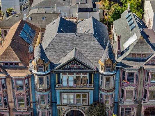Full Shingle Roof Replacement on Historic Victorian Landmark by ELM Roofing Contractors in San Francisco, CA - At ELM Roofing Contractors, we recently completed a full tear-off and shingle roof replacement on this historic Victorian in San Francisco, CA. This wasn’t your typical roofing job. Working on a preserved structure demands skill, precision, and respect for its original design.
The project involved steep rooflines, intersecting gables, decorative turrets, and multiple skylights, all of which required custom handling. Since this is a historic property, preserving its architectural integrity was just as critical as improving its protection.
We carefully removed the existing shingles and underlayment, taking extra care not to damage the original woodwork. After inspecting and reinforcing the decking, we installed synthetic underlayment to enhance waterproofing and ventilation. These are essential upgrades for older buildings that lack modern moisture control.
The new roof features architectural asphalt shingles, selected for both durability and visual compatibility. Their dimensional profile pairs well with the Victorian’s classic facade while offering UV resistance and Class A fire protection, suited for San Francisco’s climate.
We also re-flashed several skylights and custom-fitted flashing around chimneys and turret bases, which are common weak points in historic roofs. The result is a clean, weather-tight installation that respects the building’s history while securing its future.
Have a historic property in San Francisco? Call ELM Roofing Contractors. We specialize in complex roofing done right. Full Shingle Roof Replacement on Historic Victorian Landmark by ELM Roofing Contractors in San Francisco, CA - At ELM Roofing Contractors, we recently completed a full tear-off and shingle roof replacement on this historic Victorian in San Francisco, CA. This wasn’t your typical roofing job. Working on a preserved structure demands skill, precision, and respect for its original design.
The project involved steep rooflines, intersecting gables, decorative turrets, and multiple skylights, all of which required custom handling. Since this is a historic property, preserving its architectural integrity was just as critical as improving its protection.
We carefully removed the existing shingles and underlayment, taking extra care not to damage the original woodwork. After inspecting and reinforcing the decking, we installed synthetic underlayment to enhance waterproofing and ventilation. These are essential upgrades for older buildings that lack modern moisture control.
The new roof features architectural asphalt shingles, selected for both durability and visual compatibility. Their dimensional profile pairs well with the Victorian’s classic facade while offering UV resistance and Class A fire protection, suited for San Francisco’s climate.
We also re-flashed several skylights and custom-fitted flashing around chimneys and turret bases, which are common weak points in historic roofs. The result is a clean, weather-tight installation that respects the building’s history while securing its future.
Have a historic property in San Francisco? Call ELM Roofing Contractors. We specialize in complex roofing done right.