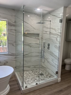 Bathroom Remodel, San Ramon - Remodeled master bathroom to create a bathroom tailored to the homeowner's liking and lifestyle. From tile walls continuing from the shower enclosure to enhancing the entire wall, to a beautiful bathtub positioned for a relaxing view, this bathroom has it all! Bathroom Remodel, San Ramon - Remodeled master bathroom to create a bathroom tailored to the homeowner's liking and lifestyle. From tile walls continuing from the shower enclosure to enhancing the entire wall, to a beautiful bathtub positioned for a relaxing view, this bathroom has it all!
