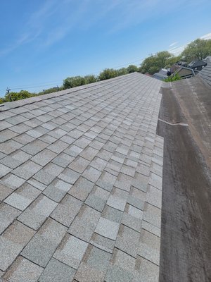 Shingle roof - New roofing shingles on roof Shingle roof - New roofing shingles on roof