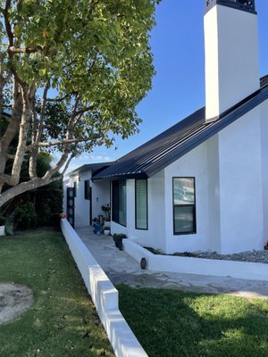 YORBA LINDA - Beautiful Standing Seam Metal Roof. The material is 24ga Galvalume Metal with Kynar Finish in Black. A chimney cap was also fabricated in-house.