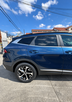 Kia Sportage | Rear Door Collision Repair - This Kia Sportage came to our shop with side collision damage to the rear passenger door, including a noticeable dent, deep scratches, and paint damage. Our team restored the damaged area and refinished the panel to achieve a smooth finish and consistent color match. The result is a clean, seamless appearance that blends with the rest of the vehicle. Kia Sportage | Rear Door Collision Repair - This Kia Sportage came to our shop with side collision damage to the rear passenger door, including a noticeable dent, deep scratches, and paint damage. Our team restored the damaged area and refinished the panel to achieve a smooth finish and consistent color match. The result is a clean, seamless appearance that blends with the rest of the vehicle.