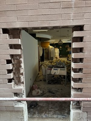New opening and installation of the doors - This opening was made at kids center. They needed a new emergency door. We made a new opening in the existing wall. 
We installed two metal lintel about the door to support new opening. In the end, we sealed doors with caulking from both sides.