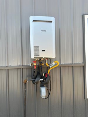 Outdoor Tankless water heater install - Customer wanted their tankless water heater replaced but to save room in their garage they wanted it installed outside, so we installed an outside tankless water heater. Outdoor Tankless water heater install - Customer wanted their tankless water heater replaced but to save room in their garage they wanted it installed outside, so we installed an outside tankless water heater.