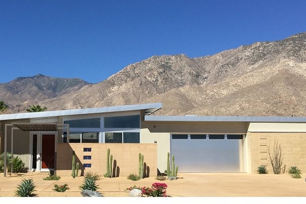 Modern, brushed aluminum garage door with windows. New Liftmaster garage door motor. - This was a remodel done in south Palm Springs. The builder opted for a ultra-modern, brushed aluminum garage door with windows.