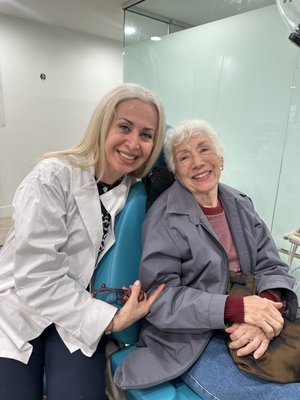 Bone and Gum regeneration - Happy patient after receiving treatment laser for dentistry for bone and gum regeneration.