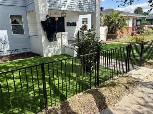 Front yard artificial turf project - This was a nice small front yard area in downtown St. Petersburg, all the old grass was removed, area, leveled, graded, and base installed and compacted for artificial turf to be laid down and securely fastened. ￼