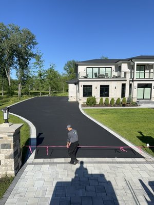 Driveway sealcoating - This is how a fresh coat of sealer can revive a homes a appearance and improve its curb appeal. And not only that, it also increases the longevity of your driveway to help protect your investments! Driveway sealcoating - This is how a fresh coat of sealer can revive a homes a appearance and improve its curb appeal. And not only that, it also increases the longevity of your driveway to help protect your investments!