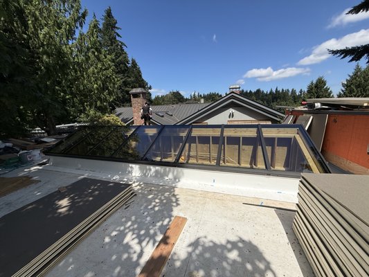 Crystalite Skylight Installation – Mercer Island, WA - Crystalite Skylight Installation – Mercer Island, WA
Framework Construction recently completed a custom Crystalite skylight installation in Mercer Island. Our scope included installation of the aluminum framing components, setting the glass panels, and completing the final sealing of the system.
The completed skylight provides abundant natural light while maintaining a clean, modern appearance. We are proud to have been part of this project and appreciate the opportunity to work alongside the project team.
Scope of Work
* Aluminum framing installation
* Glass panel installation
* Final sealing and finishing
Location
Mercer Island, Washington Crystalite Skylight Installation – Mercer Island, WA - Crystalite Skylight Installation – Mercer Island, WA
Framework Construction recently completed a custom Crystalite skylight installation in Mercer Island. Our scope included installation of the aluminum framing components, setting the glass panels, and completing the final sealing of the system.
The completed skylight provides abundant natural light while maintaining a clean, modern appearance. We are proud to have been part of this project and appreciate the opportunity to work alongside the project team.
Scope of Work
* Aluminum framing installation
* Glass panel installation
* Final sealing and finishing
Location
Mercer Island, Washington