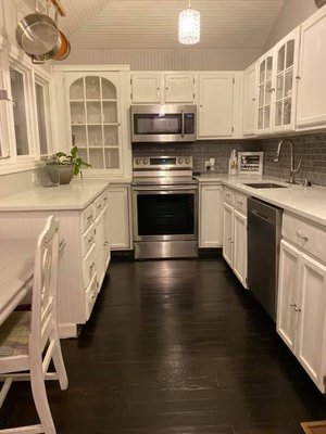 Complete kitchen remodel - This was a complete kitchen remodel painting cupboards cabinets ceiling staining floor