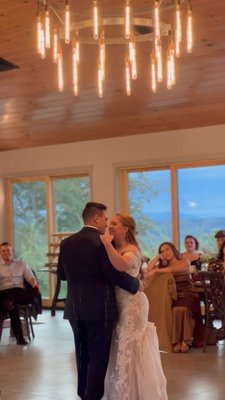 The Mazariego’s Wedding 2023 - I booked this wedding in the fall of 2022. Me and the Mazariego’s spoke a lot with excite for how the day would be and it was amazing when the day came. The ceremony outside with a beautiful view of the mountains. I used my wireless battery powered ceremony setup for a seamless wedding. The cocktail hour was in the first barn. Which I used a Bluetooth speaker for. The second barn hosted the reception. I prepared my elegant dj booth and pro grade speakers with two microphones.