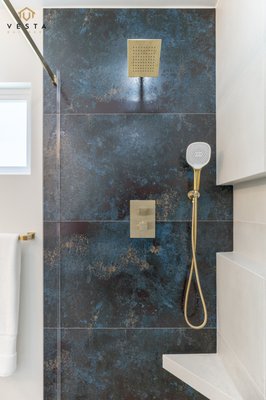 Primary Bathroom Remodel - This project involved a complete reconfiguration of the primary bathroom and walk-in closet. The homeowners wanted to separate the closet from the bathroom and create a stunning primary bathroom. The transformation includes a spacious custom vanity with a laundry pullout, sleek niches, recessed mirror medicine cabinets, and elegant large-format tiles that tie the whole space together beautifully. Primary Bathroom Remodel - This project involved a complete reconfiguration of the primary bathroom and walk-in closet. The homeowners wanted to separate the closet from the bathroom and create a stunning primary bathroom. The transformation includes a spacious custom vanity with a laundry pullout, sleek niches, recessed mirror medicine cabinets, and elegant large-format tiles that tie the whole space together beautifully.