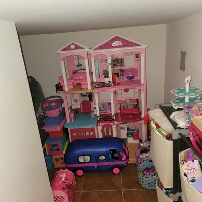 Tiffany play closet - This was for a six year old play closet. great use of space for her to have downstairs and not have to go to her room to play. Made the space feel like hers by adding personal touches and making toys easy to grab.