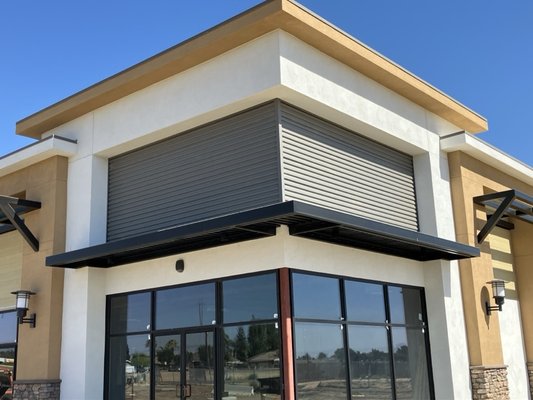 New Construction in Bakersfield - Single Ply and Metal Siding - We completed the project with the metal siding. We installed a Carlisle TPO roof system over insulation board. The metal siding we installed from Taylor Metals really makes this building pop. Take a look and see for yourself. New Construction in Bakersfield - Single Ply and Metal Siding - We completed the project with the metal siding. We installed a Carlisle TPO roof system over insulation board. The metal siding we installed from Taylor Metals really makes this building pop. Take a look and see for yourself.