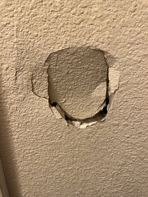 Punch in a Drywall Repair - Punch in a drywall repair, patching, finishing, texturing. Punch in a Drywall Repair - Punch in a drywall repair, patching, finishing, texturing.