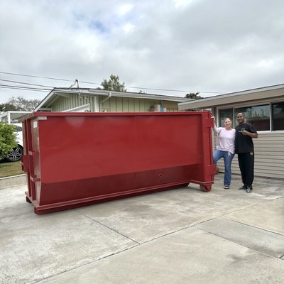 Home Clean Out - Say hello to our shiny new fleet of driveway-friendly dumpsters! 🚛🆕 At just 12 feet long, they'll slot right into your space, ready to tackle whatever you throw at them (literally!). No more worrying about size constraints, our dumpsters are like the puzzle pieces that fit perfectly into your cleanup game. 🧩💪

Meet Mr. and Mrs. Smith, beaming with the joy of hassle-free decluttering. They've taken the leap towards a cleaner, more spacious home with our newest addition! 🏡🌈 Want to join them on this journey?

Get in touch today and let's make room for more joy in your life! 😊📞#DeclutteringMadeEasy #SpaceForJoy