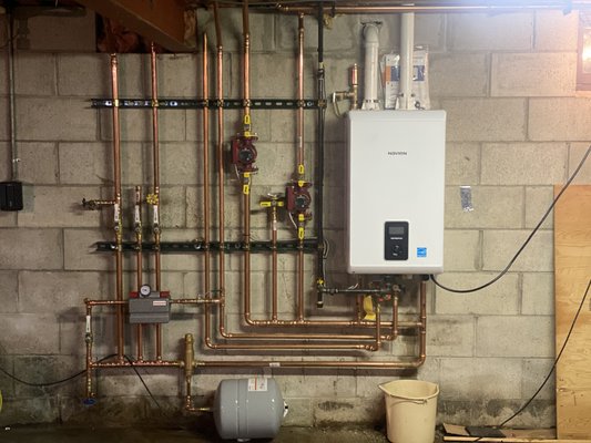 Boiler and Ac Replacement and Upgrade - Customer called for an upgrade to there boiler and ac unit
they had an old oil burner Boiler and an old air handler for the ac
Our team upgraded then to a navien tankless boiler water heater combo
and a new air handler.
Giving them more control of there heat and giving them on demand endless hot water
also set them up for the ability to have in floor heat when there ready