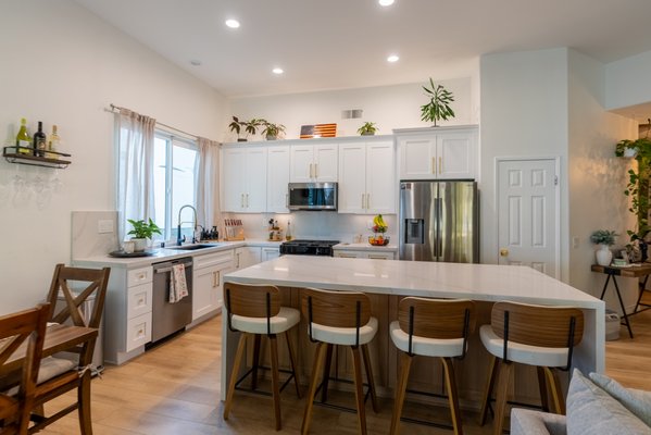 New ADU Design And Build By We The People Construction, A Leading Remodeling Contractors Company In Fullerton, CA - Welcome to this beautifully remodeled home in Fullerton, CA, brought to life by expert remodeling contractors. Our licensed general contractors transformed this kitchen into an inviting space that combines elegance and functionality. With custom kitchen cabinets, modern finishes, and a spacious layout, this kitchen remodel highlights our commitment to quality and attention to detail. As experienced kitchen remodelers, we specialize in kitchen and bath remodeling, offering customized kitchen designs that meet each client's unique needs.

In addition to kitchen renovations, we’re also skilled ADU contractors. From ADU design and planning to securing permits, our team handles every aspect of ADU construction. Whether you’re considering a kitchen addition or converting a garage to an ADU, our ADU architects and designers will guide you through each step. As trusted home remodeling contractors, we ensure your project is executed with precision and care, creating spaces that reflect your vision and enhance your lifestyle.

For your next project, trust the general contractors at We The People Construction to bring your dreams to life in Fullerton and beyond. Whether it's a kitchen remodel or an ADU plan and permit process, we’re here to make your renovation journey seamless and satisfying.