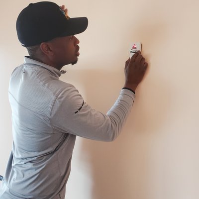 Smart TV Mounting Services - Safely mounting a tv on a commercial move. Perfectly level, and mounted sturdy, its not going anywhere!
