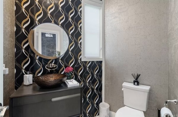 Bathroom wall Décor Project - OC Elite Remodeling turned this powder room into a sheik powder room.