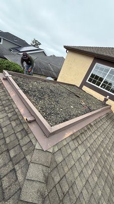 Flat Roof Replacement - This was a fun project in Halfmoon Bay where we stripped the tar and gravel roof to the bare roof deck. We made repairs to damaged wood and sealed it up with a 3 layer built up roof system. Not only were we able to clean up the look but also solved the pooling problem our client was previously having.