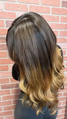 Long layers with warm tones. Schwarzkopf blonde me and biscuit toner. - Balayage/ombré color. Schwarzkopf blonde me lightener with custom Biscuit toner. We did a layered cut and curtain bangs. Conditioning treatment to restore the hairs moisture and to strengthen it to reduce damage. Then finished with thermal protection and curls.