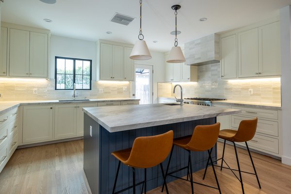 Complete Remodel - This project encompassed the renovation of four bathrooms and a kitchen, as well as the flooring throughout, within a two-story structure measuring 900 sq ft.