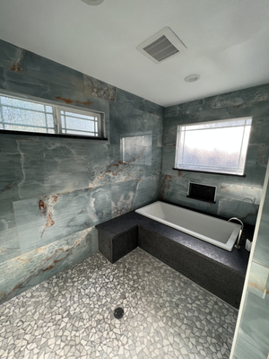 Bathroom of ADU 2022 - We have a key specialty in bringing in peoples dreams and turning them into realities. This client wanted to "Bathe and shower in a quartz green cave". With planning and putting in precise work, we could translate exactly what she wanted into real life. Bathroom of ADU 2022 - We have a key specialty in bringing in peoples dreams and turning them into realities. This client wanted to "Bathe and shower in a quartz green cave". With planning and putting in precise work, we could translate exactly what she wanted into real life.