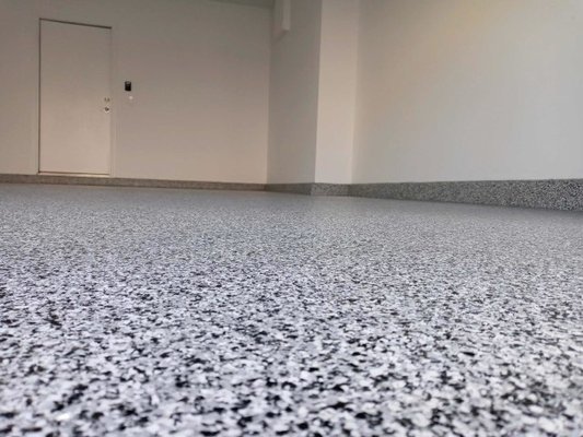 Gray Flake Floors - We have several standard and stone collection flake floors in the gray tones. These range in color and design, but are all the polyurea base/polyaspartic topcoat resins that are exclusive to FastLane Coatings in Las Vegas.