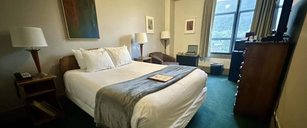 Mountain View Queen Rooms - Our Mountain View Queen rooms look out over Main Street and onto Brattleboro’s stately companion peak: Mount Wantastiquet. If you’re coming to our hotel for rest and respite, we recommend the expansive feel of the Mountain View Queen rooms. Mountain View Queen Rooms - Our Mountain View Queen rooms look out over Main Street and onto Brattleboro’s stately companion peak: Mount Wantastiquet. If you’re coming to our hotel for rest and respite, we recommend the expansive feel of the Mountain View Queen rooms.
