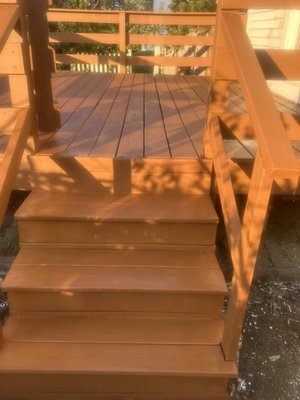 Deck staining - This remodel was a customer that no longer wanted white and a almost black bottom decking color. They chose brown the color went on really well.