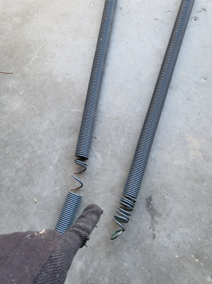 Extension Spring repair/installation job. - This is an older extension spring job. As you can see, the old springs were severely worn and stretched out. I added the new extension springs, balanced the door and put on new cables. The garage door system works great. Call me for your extension OR torsion spring job today! J.R. at SPEE-DEE 402-457-9820! Extension Spring repair/installation job. - This is an older extension spring job. As you can see, the old springs were severely worn and stretched out. I added the new extension springs, balanced the door and put on new cables. The garage door system works great. Call me for your extension OR torsion spring job today! J.R. at SPEE-DEE 402-457-9820!