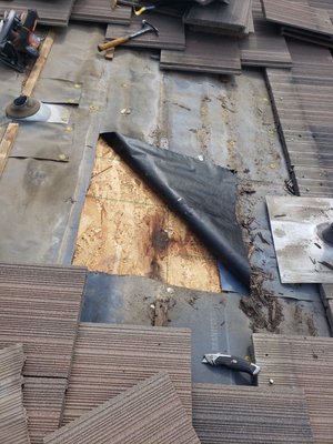 Tile roof repair - This was a roof that had been leaking for a while. We were able to pinpoint the issue by removing the tiles row by row, searching for the failure in the underlayment. We were able to correct it and the customer is leak free! Tile roof repair - This was a roof that had been leaking for a while. We were able to pinpoint the issue by removing the tiles row by row, searching for the failure in the underlayment. We were able to correct it and the customer is leak free!